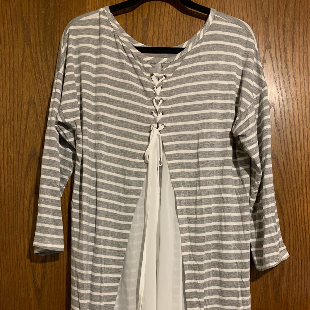 Gray shirt with white stripes